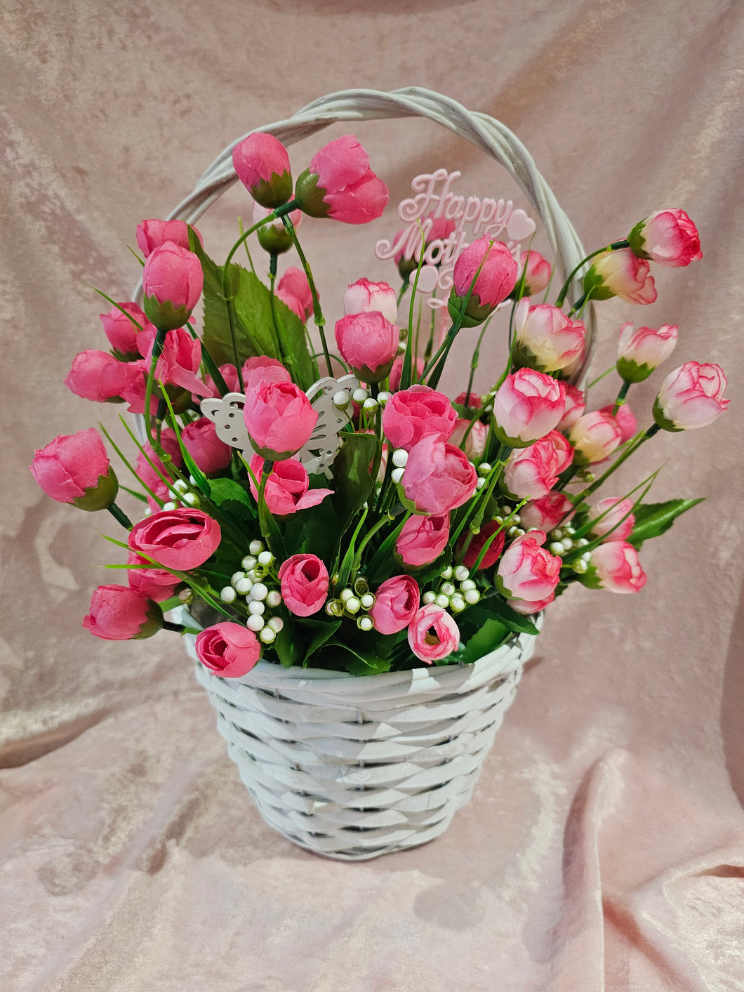 White  Basket Full of Pink Faux Flowers
