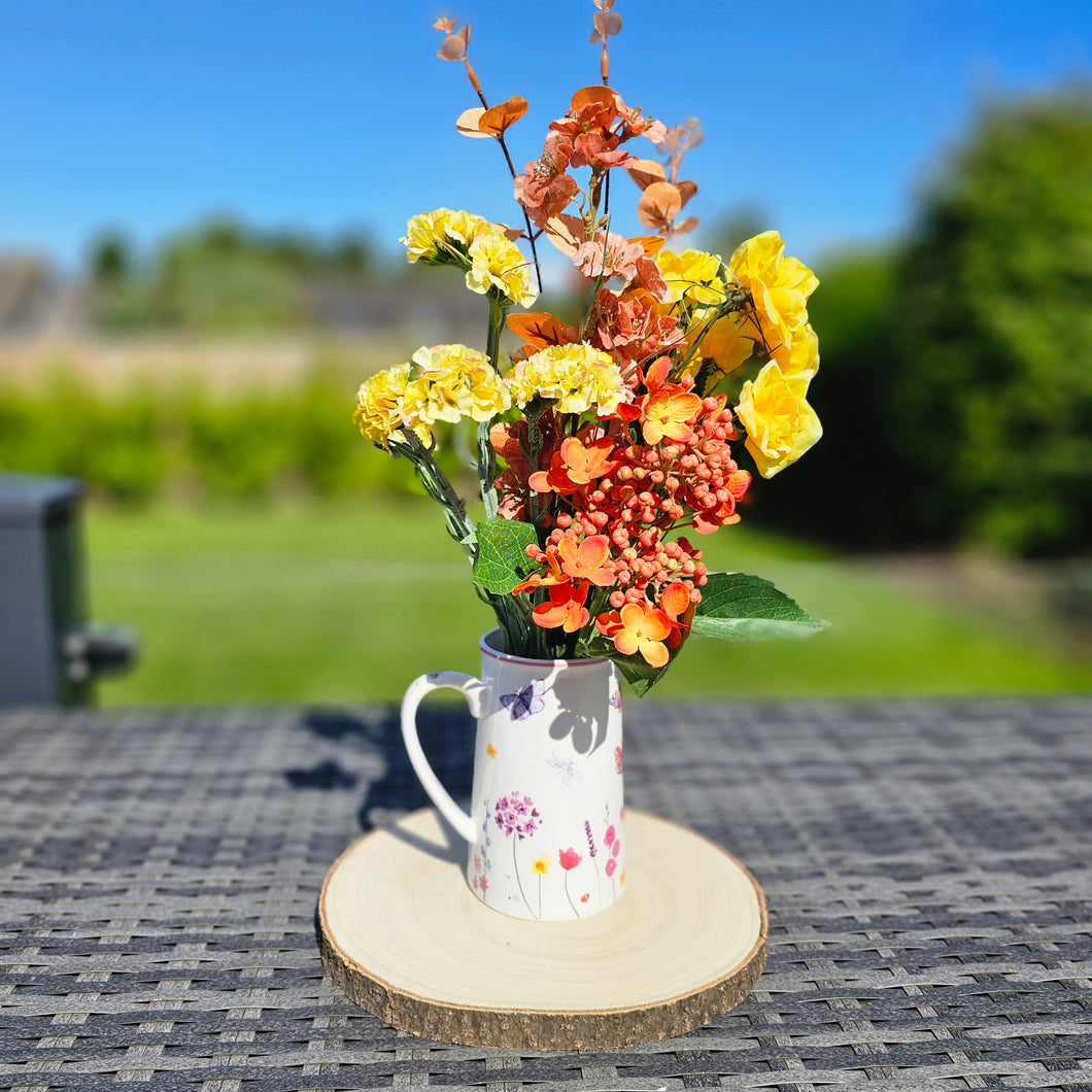 Silk Orange and Yellow Flowers in China Jug