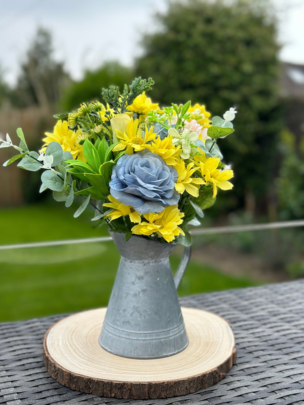 Blue Rose and Mixed Yellow Floral Bouquet in Jug